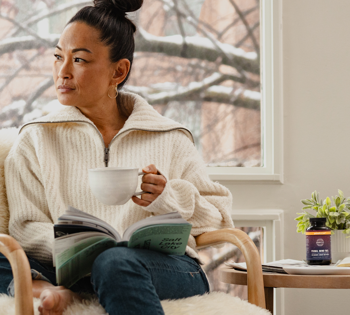 Woman drinking tea with primal mind fuel